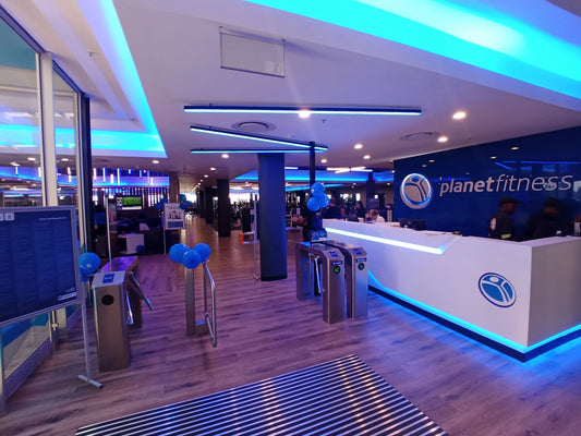 Lighting transformation at Planet Fitness Johannesburg